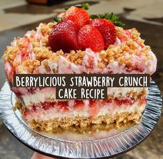 there is a cake with strawberries on it and the words berrylicious strawberry crunch cake recipe