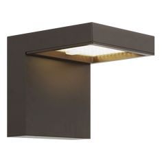 a light that is on top of a wall mounted fixture with a square shape design