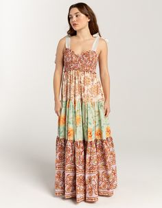 Free People Bluebell Maxi Dress. Printed To Perfection In A Forever Femme Floral Print, This Stunning Maxi Dress Features A Smocked Bust With Tiered Bottom Skirt And Exaggerated Shoulder Ties For An Added Sweet Touch. Staple, A-Line Fit. V-Neckline, Smocking At Bust, Tiered Bottom Piecing, Effortless Pull-On Style. Approx. Length: 53''. 100% Cotton. Machine Wash. Imported. Model Is Wearing A Size Small. Model Measurements:height: 5'7" Bust: 32"waist: 24.5"hips: 36" Dresses Y2k, Boho Floral Maxi Dress, Dresses Flowy, Flowy Summer Dresses, Boho Dresses, Sleeveless Long Dress, Flowy Maxi Dress, Floral Sundress, Vintage Floral Print