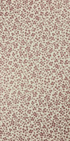 a red and white wallpaper with small flowers on it