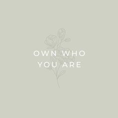 the words own who you are written in white on a light gray background with flowers