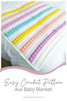 the crochet baby blanket is made with multicolored yarn