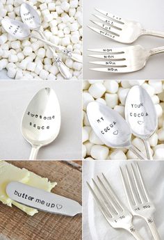 four different spoons with words written on them and some white rocks in the background