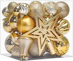 gold and silver ornaments in a clear box