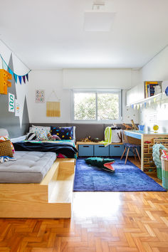 a living room filled with lots of furniture and decor