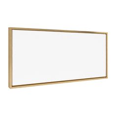 a white board mounted on the wall with a gold frame and wood trimmings