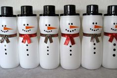 six snowmen are lined up next to each other