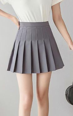 Grey High Waisted Tennis Mini Skirt. This grey skirt is made of a soft stretchable fabric. This grey skirt will make you you look very beautiful and elegant. The features of this skirt are the following: grey color, high waist. Gray Lined Skort Short Length, Gray Lined Skort Of Short Length, Gray Short Length Skort, Gray Short Length Lined Skort, Gray High Waist Skirt For Spring, Gray Pleated Skort, Grey Pleated Short Skort, Gray Mini Length Pleated Skirt For Spring, Spring Gray Pleated Mini Skirt