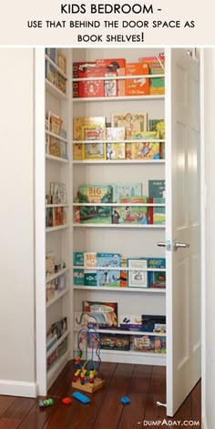 an open book shelf with toys and books on it in a room next to a door