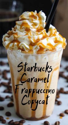 starbucks caramel frappuccino copycat is on the table with coffee beans