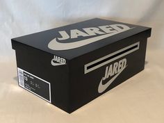 a black box with the word jahred printed on it and a white background