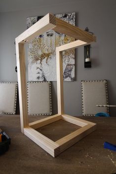 a wooden frame sitting on top of a table