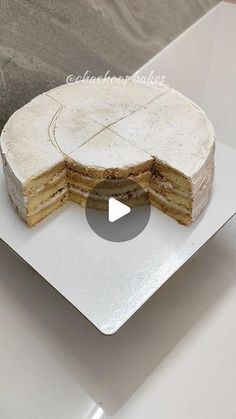 a cake is cut in half on a plate