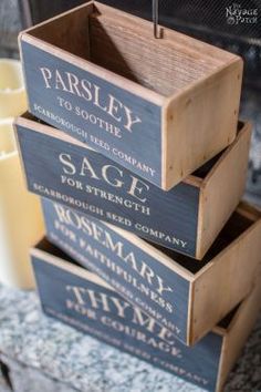 three wooden crates stacked on top of each other