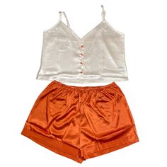 Shein Satin Cami Top Two Piece Orange Bridesmaids Wedding Pj Set Slip Right Into Bed With This Easy To Wear Cami Set. With A Short Cami Tank Top Accented With Orange Buttons And Matching Elastic Waist Shorts. New With Tags, And Contains No Flaws. Look Confident, Feel Confident Offers Welcome Orange Pajamas, Orange Bridesmaids, Look Confident, Pajamas Aesthetic, Orange Bridesmaid, Lounge Wear Set, Silky Pajamas, Young Sheldon, Satin Pj Set