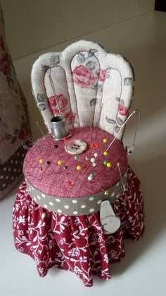 a chair made out of fabric and buttons