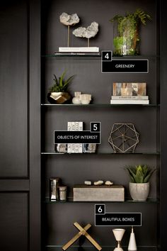 a book shelf filled with books and plants