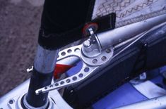 a close up view of the front brake on a bike