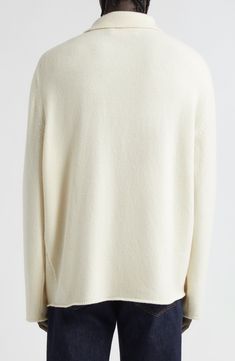 The LA-based label adds another staple to its repertoire of impeccable knitwear with a soft cashmere polo-sweater detailed with a tropical intarsia sunset. Button half placket Spread collar Long sleeves 100% cashmere Dry clean Made in the USA Designer Clothing Cream Cashmere Sweater With Ribbed Cuffs, Cream Cashmere V-neck Sweater For Winter, White Cashmere V-neck Sweater For Fall, Classic Cream Sweater With Ribbed Cuffs, Classic White V-neck Sweater For Work, Classic Beige Wool V-neck Sweater, Classic White Cashmere Top, Luxury Cashmere Sweater With Ribbed Collar, Classic Cream Cashmere Sweater