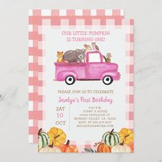 a pink truck with animals in the bed and pumpkins