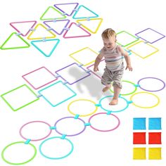 a toddler playing with colorful circles and shapes