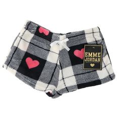 Emme Jordan's fuzzy shorts are essential to every young ladies wardrobe. The machine washable polyester fabric is light weight, while being warm and cozy. These plush junior cut shorts have an elastic stretch waist, topped with a cute bow. With tons of prints, these small shorts can be worn as pajamas, over a swimsuit, or just lounging about. Affordable enough to grab a pair for each of your daughter's friends, these bottoms are sure to be a hit at her next sleep over party! Size: L.  Color: Whi