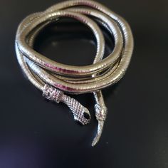 CHOOSE ONE ;-Vintage Twist Snake Necklace.Serpent Snake Bracelet. Silver ton Snake Necklace. Gorgeous piece of jewelry, Unique and versatile and can be used not only as  a necklace but also as a winding twist bracelet or belt .Please contact me if you have any questions . I don't accept cancellations .Thank you for shopping. Vintage Silver Snake Jewelry, Serpent Snake, Twist Bracelet, Twisted Bracelet, Snake Jewelry, Snake Bracelet, Snake Necklace, Bib Necklaces, Vintage Bracelet