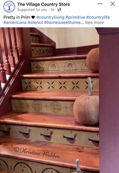 the stairs are decorated with decorative wallpapers and pumpkins for decorating them