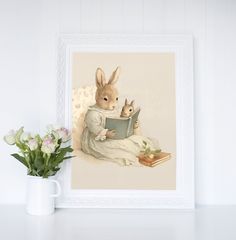 a painting of a rabbit reading a book next to a vase with flowers