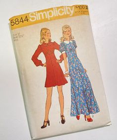 an old fashion sewing book with two women in dresses on the front and back cover