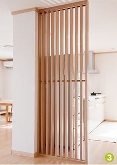 a room divider made out of wooden slats