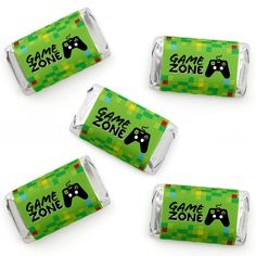 four candy bar wrappers with video game zone on them, all decorated in green and black