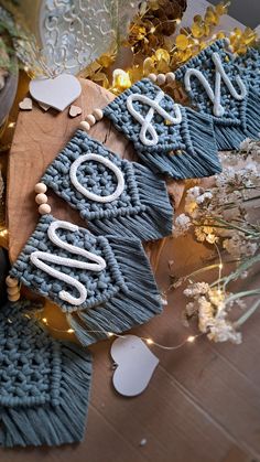 some type of decoration on a table with lights and decorations in the shape of letters