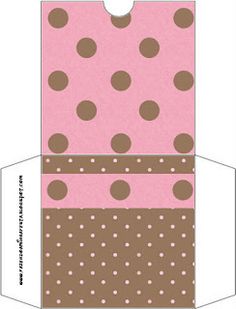 an open box with polka dots on the bottom and brown spots on the top, sitting in front of a white background