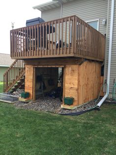 a wooden deck on top of a house