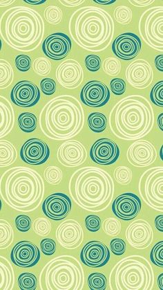 a green and blue pattern with circles on the bottom, in various sizes and colors