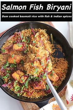 salmon fish biriyani in a skillet with rice and spices on the side