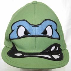 Leonardo TMNT Leo Teenage Mutant Ninja Turtles Hat Green Fitted Cap Size 7 3/8 Leonardo TMNT Leo Teenage Mutant Ninja Turtles Hat Green Fitted Cap Size 7 3/8 Leonardo TMNT Leo Teenage Mutant Ninja Turtles Hat Green Fitted Cap Size 7 3/8 Leonardo TMNT Leo Teenage Mutant Ninja Turtles Hat Green Fitted Cap Size 7 3/8 Leonardo Ninja Turtles Adult Baseball Hat Fitted Cap Size 7 3/8 - White/Black Fitted Cap Teenage Mutant Ninja Turtles Leo / Leonardo face Made in China SIZE: Fitted Size 7 3/8 COLOR: G Ninja Turtle Hat, Leonardo Ninja Turtle, Tmnt Leo, Leonardo Tmnt, Fitted Caps, Mutant Ninja, Baseball Hat, Teenage Mutant, Teenage Mutant Ninja Turtles