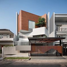 a modern house with an interesting design on the front