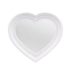 a white heart shaped mirror with beading around the edges and an oval frame in the middle