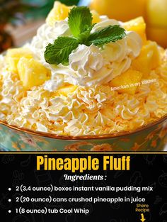 a bowl filled with pineapple fluff next to lemons and whipped cream on top