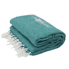 two teal towels folded on top of each other