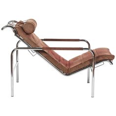 a chaise lounge chair with a wooden seat and metal frame