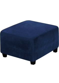 a blue footstool sitting on top of a white floor