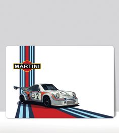 a white porsche gtr car on a race track with the word martini painted on it's side