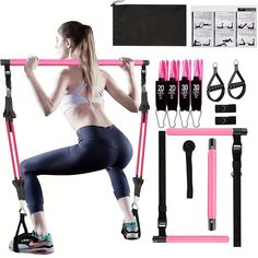 a woman is doing exercises with pink handles and straps on her back while standing in front of the gym equipment