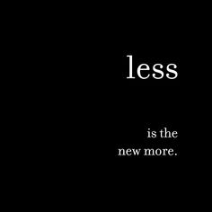 the words less is the new more on a black background