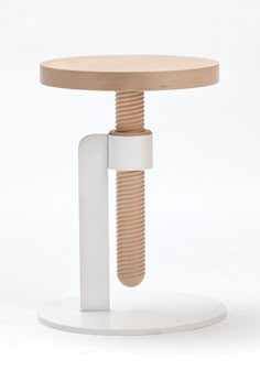 a white stool with a wooden seat and two screws attached to the backrest