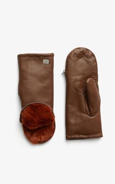 No mitten is as stylish and warm as the BETRICE by SOIA & KYO. This short leather mitten is lined with super-soft faux fur and has a sleek zipper opening at the fingertips – a plush must-have to ward off the winter chill. Short leather mittensLined with faux furSilver metal zipper opening at fingertips with hidden magnet fastening SIZE & FIT Model is 5' 8½" / 174 cm and wears a size XS The second model is 5'8" / 173 cm cm and is wearing a size XS COMPOSITION & CARE INSTRUCTIONS Shell 100% lamb l Cascade Collar, Fall Accessories, Winter Accessories, Mitten Gloves, Leather Glove, The Winter, No. 2, Sale Items, Metallic Silver