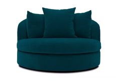 a large blue chair with pillows on it